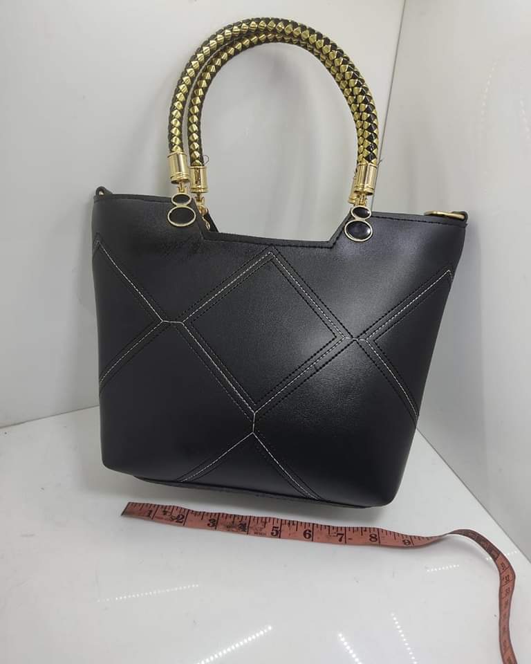 Leather X pattern handbag